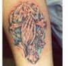 praying hand and cross tattoo